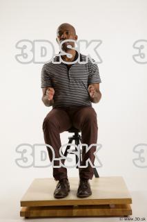 Sitting reference of whole body black white striped shirt brown…